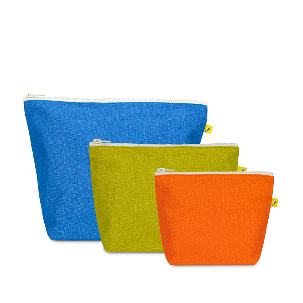 Three colorful zipper pouches (blue, green, orange) on a white background