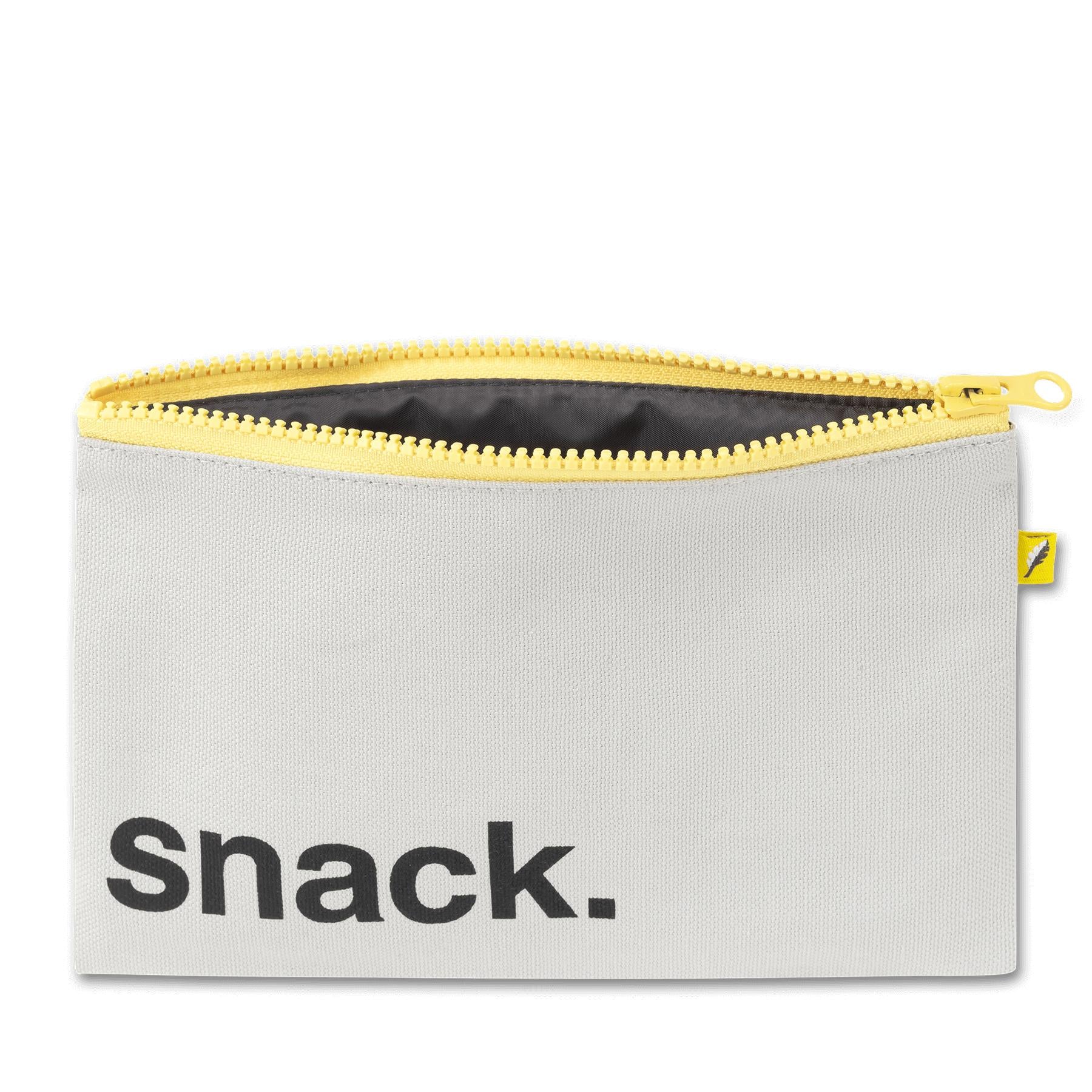 an open reusable snack pouch with yellow zipper 