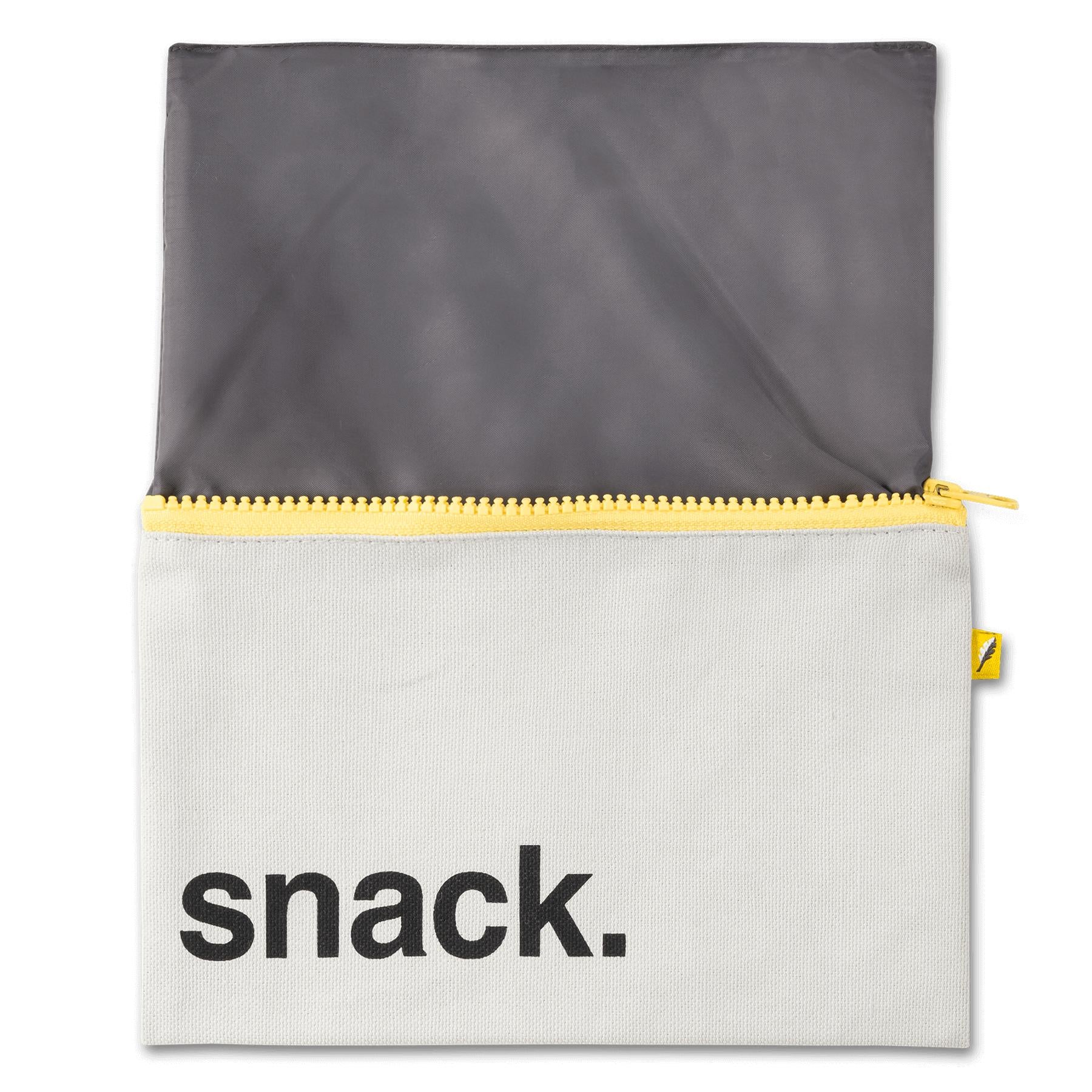 an open reusable snack pouch with yellow zipper and waterproof lining 