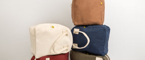 Collection of Fluf zipper lunch bags: green, white, red, nutmeg and blue lunch bags