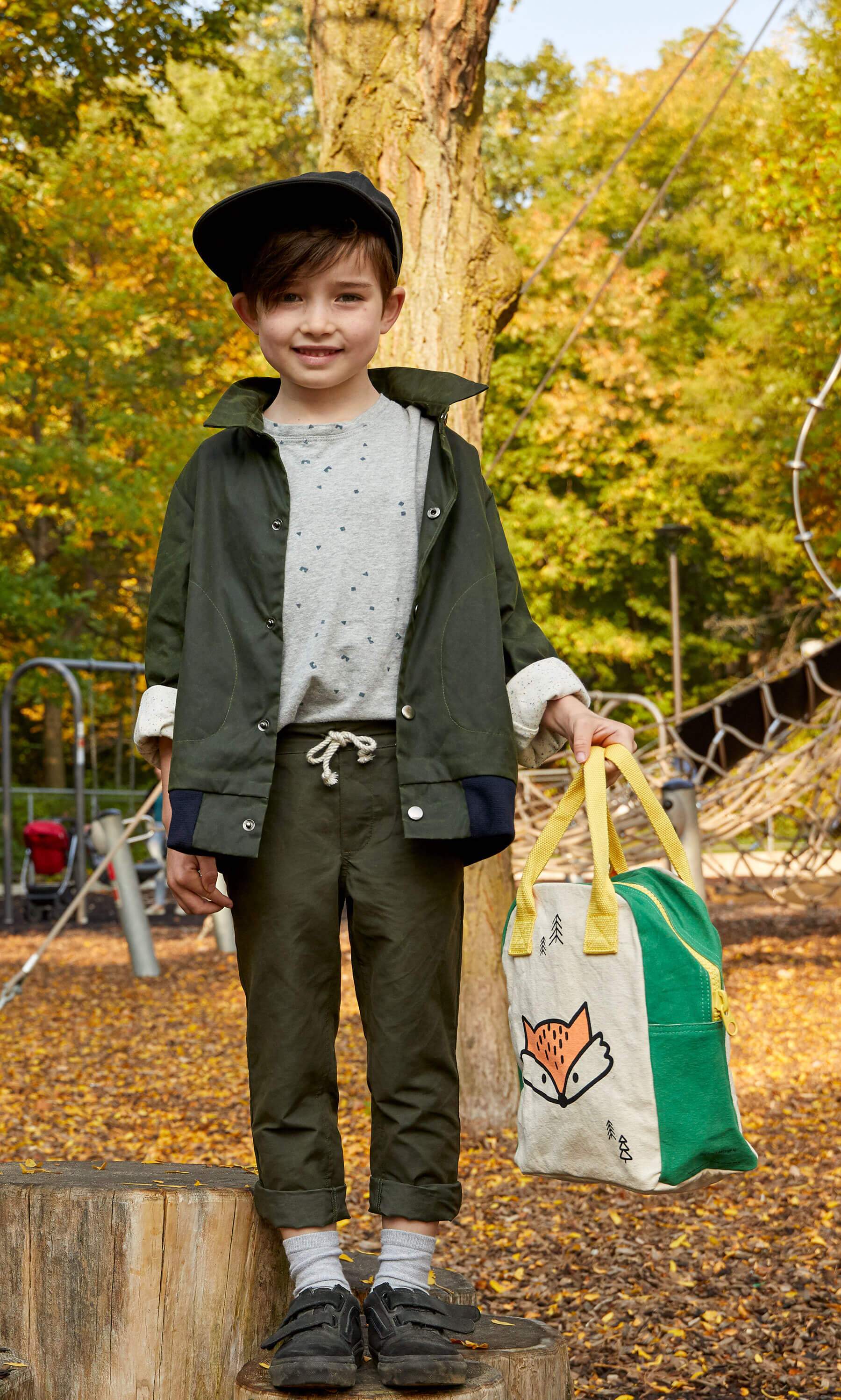 Fox Lunch Bag with a kid holding it 