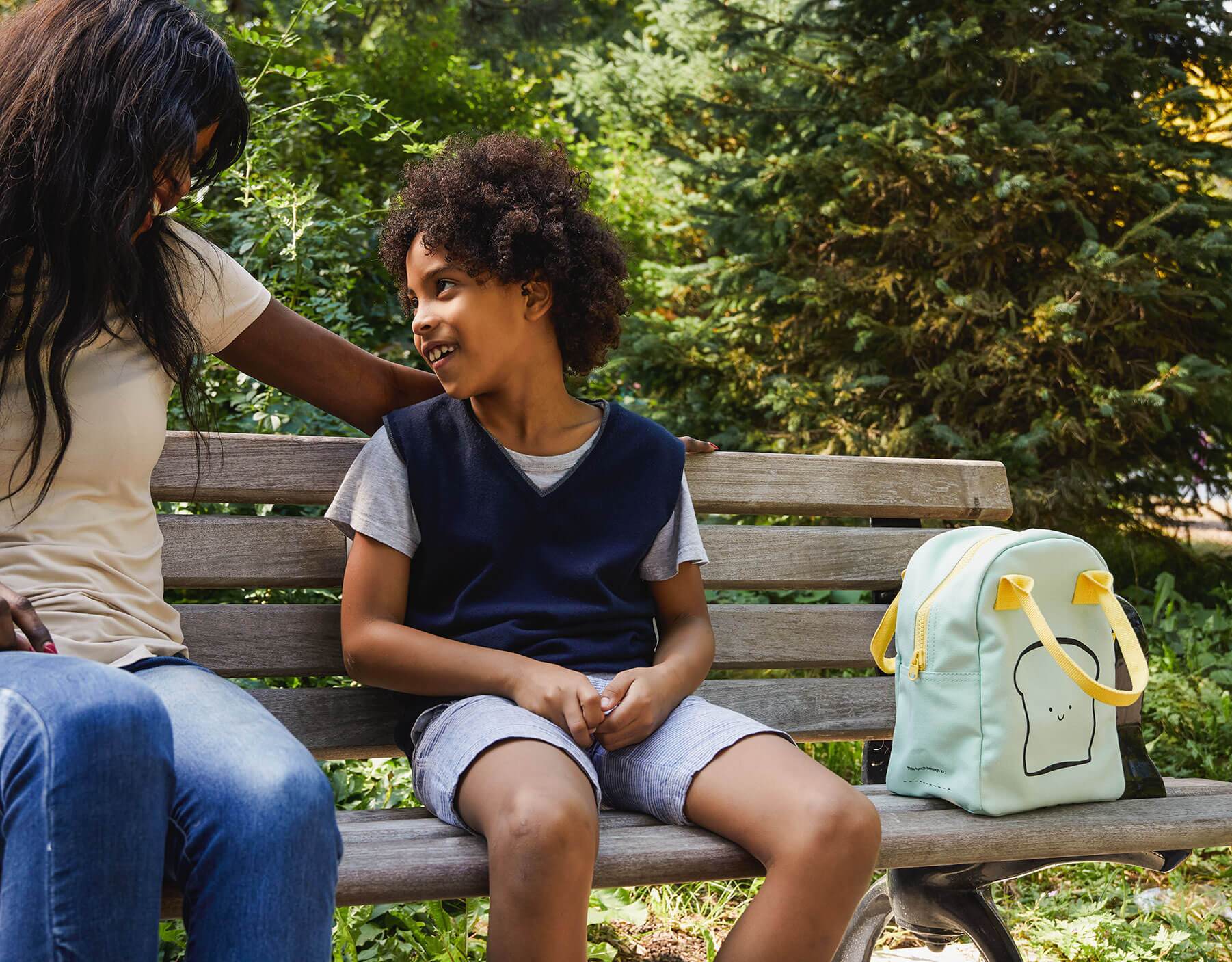 Happy Bread / Mint Lunch Bag with kids sitting on a bench 